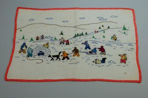 Image of Embroidered place mat with Inuit figures and igloo
